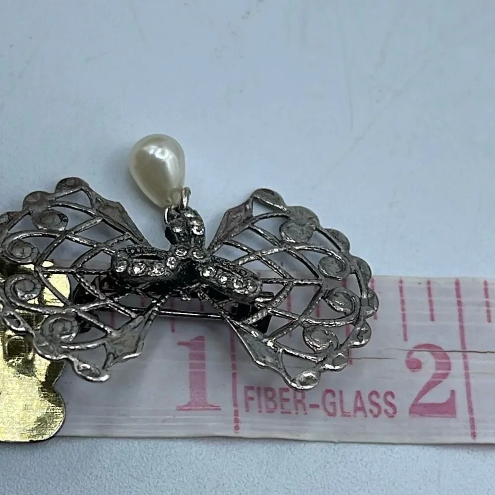 Vintage Bow & rhinestone ribbon with dangle faux pearl.